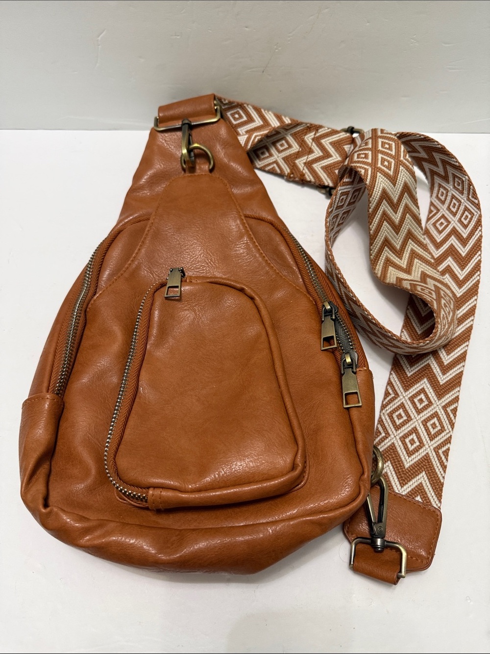 Tan Faux Leather Sling Bag with Patterned Strap